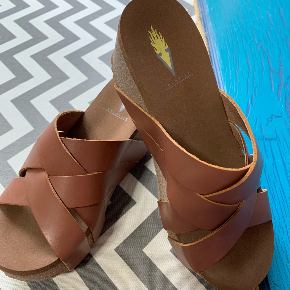Volatile brown slip on Wedges size 6